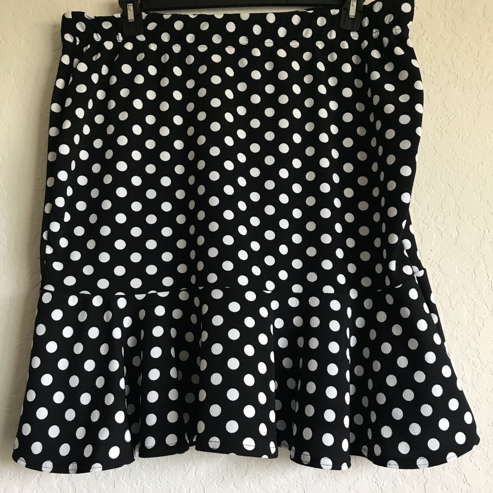 Black and white polka dot ruffle skirt.